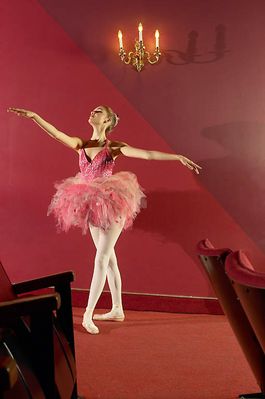 Ballerina in empty theater uid 1280956.jpg