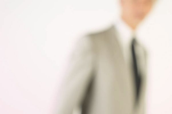 Blur of businessman in gray suit.jpg