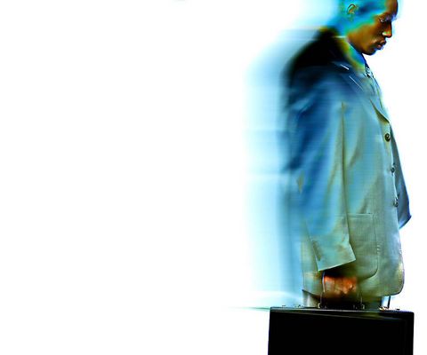 Blur of walking businessman.jpg