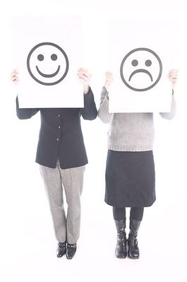 Businesswoman holding white sign with exclamation mark 2.jpg