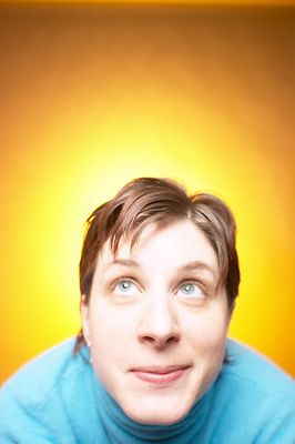 Caucasian woman smiling against yellow background 2.jpg