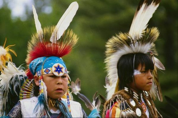 Children with elaborate Native American headdresse.jpg