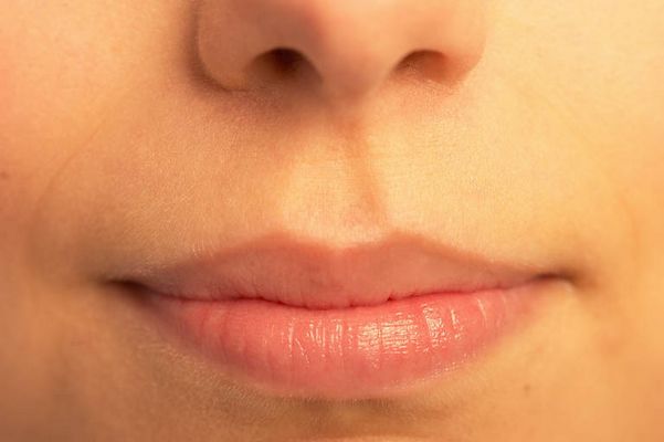 Close up of woman mouth uid 1343100.jpg