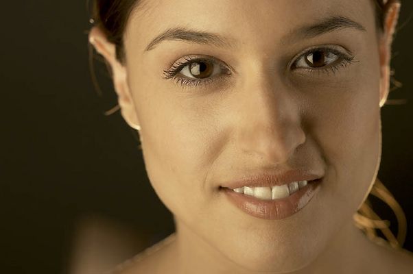 Close up of young woman smiling face.jpg