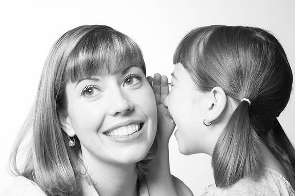 Daughter telling her mother a secret 1.jpg