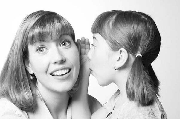 Daughter telling her mother a secret.jpg