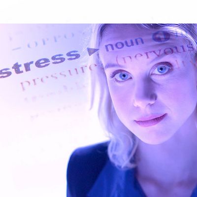 Dictionary definition of the word stress on woman face.jpg