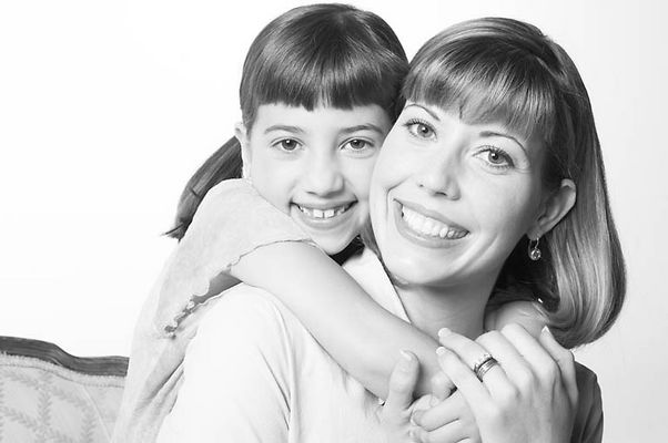 Embracing mother and daughter.jpg