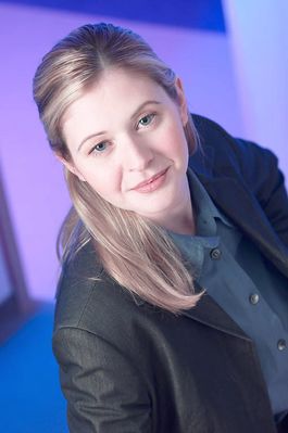 Headshot of Caucasian woman wearing leather jacket.jpg