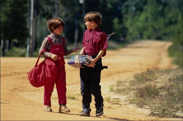 Kids walking down dirt road.jpg