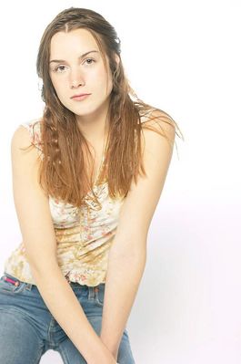 Kneeling woman in jeans 1.jpg