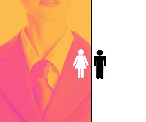 Male and female symbols on businesswoman in tie.jpg