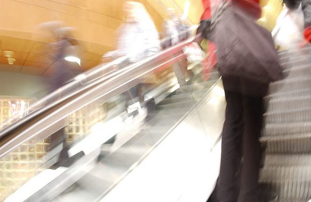 People riding escalator 2.jpg