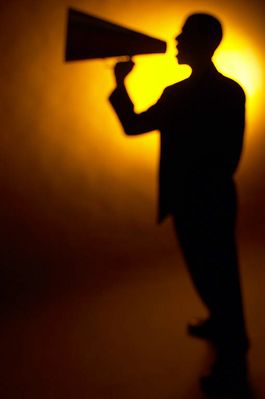 Silhouette of man yelling into a bullhorn 3.jpg
