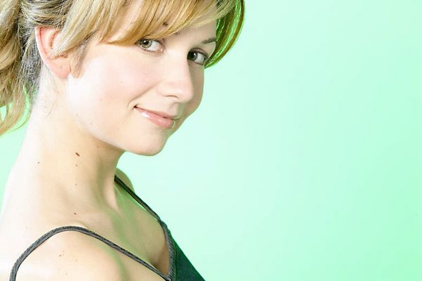 Smiling blonde young adult uid 1453408.jpg