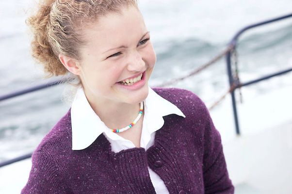 Smiling teenager on boat uid 1283653.jpg