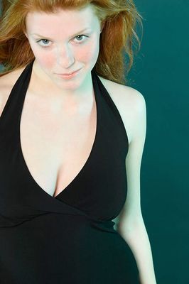 Smiling young red head uid 1455254.jpg