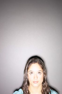 Teenaged girl looking upwards.jpg