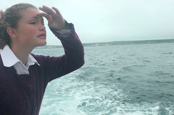 Woman looking over edge of boat.jpg