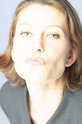 Woman puckering her lips for a kiss.jpg
