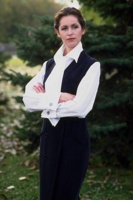 Woman standing with arms crossed.jpg