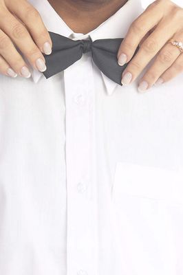 Woman tying tie 0005.jpg