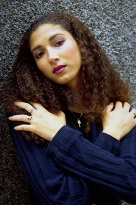Woman wearing blue sweater.jpg