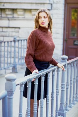 Woman wearing brown sweater.jpg