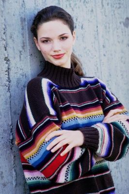 Woman with crossed arms in striped sweater.jpg