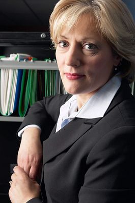 Woman with files in background.jpg