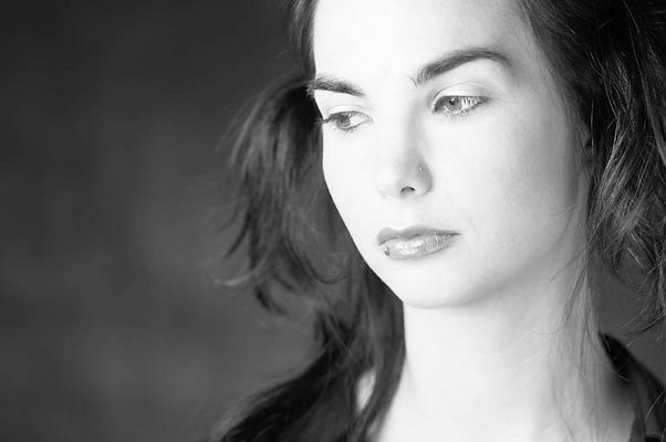 Woman with lip ring looking downwards.jpg