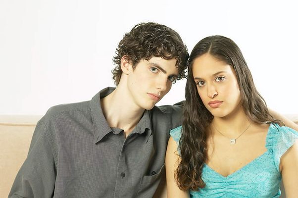 Young couple sitting on sofa.jpg