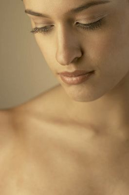 Young woman in close up looking down.jpg