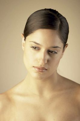 Young woman with downcast eyes uid 1284284.jpg