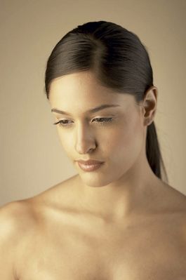 Young woman with downcast eyes.jpg