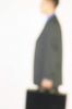 Blur of businessman holding briefcase 1.jpg