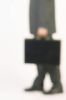 Blur of businessman holding briefcase 2.jpg