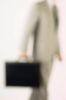 Blur of businessman walking with briefcase 1.jpg