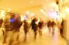 Blur of crowd walking through shopping center.jpg