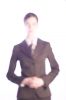 Blurred businesswoman in suit.jpg
