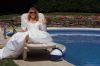 Bride lounging by pool.jpg