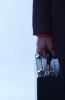Businessman in black suit with briefcase 1.jpg