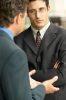Businessman in conversation uid 1435045.jpg