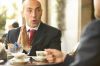 Businessman sitting in cafT uid 1433185.jpg