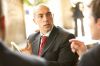 Businessman sitting in cafT uid 1433186.jpg