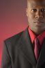 Businessman wearing red shirt and tie under black suit 2.jpg