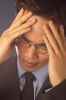 Businessman with a headache 3.jpg