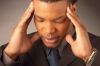 Businessman with a headache 4.jpg
