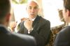 Businessmen having coffee uid 1433188.jpg
