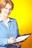 Businesswoman writing in day planner 101.jpg